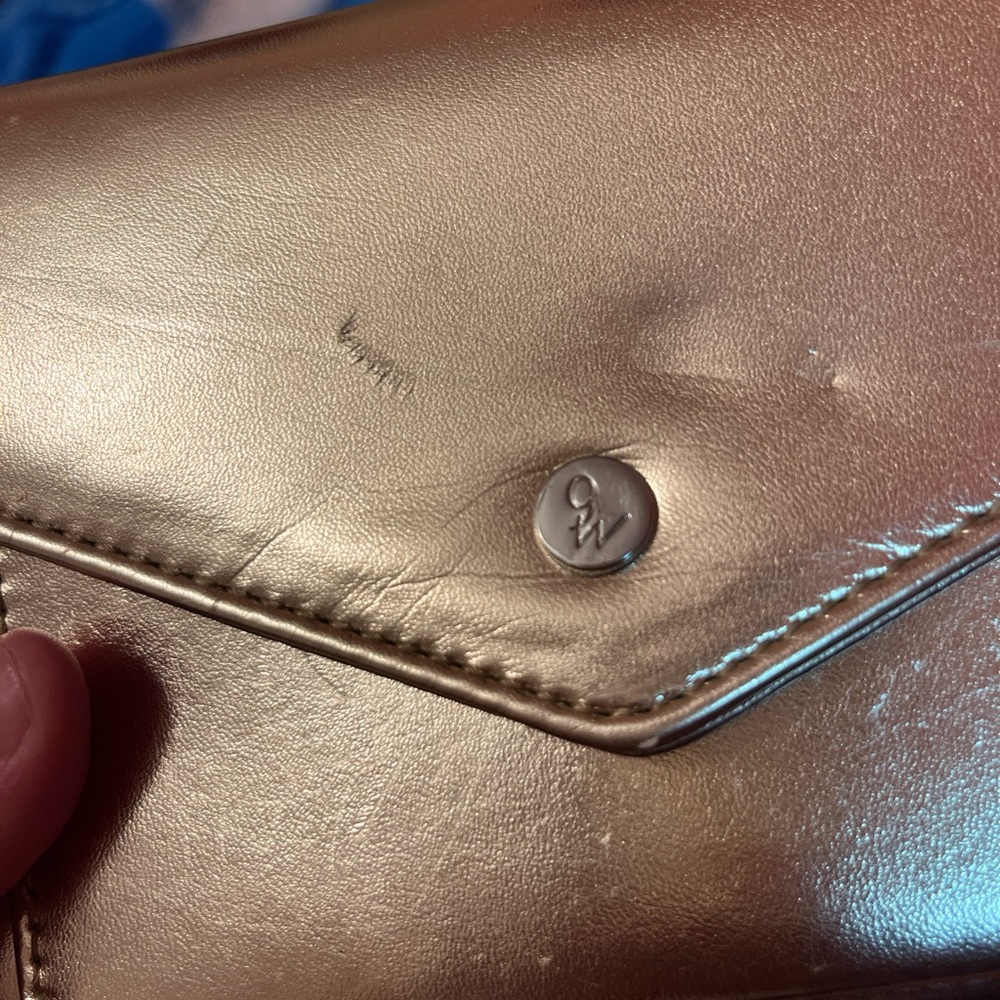 Gold nine west purse in ok condition minor scratches